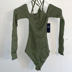 Long sleeve bodysuit with cross around the neck